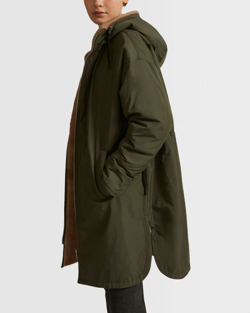 Long reversible coat in technical fabric and mink fur