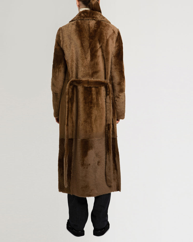 Long reversible belted shearling coat