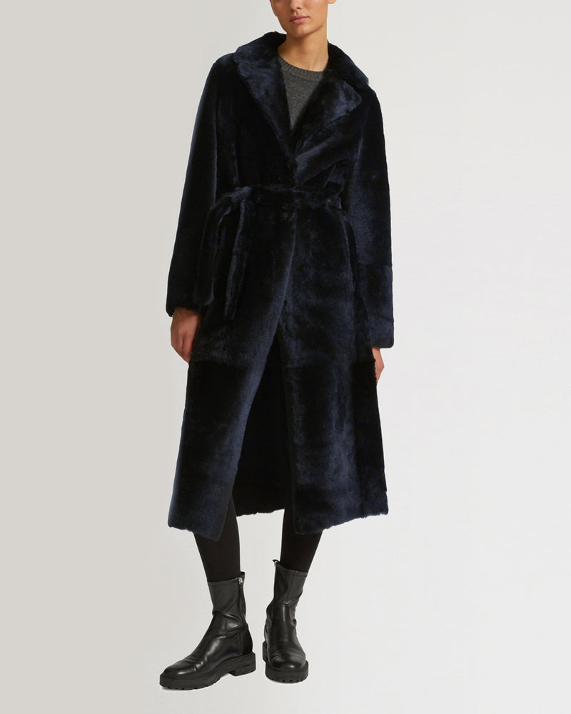 Long reversible belted shearling coat