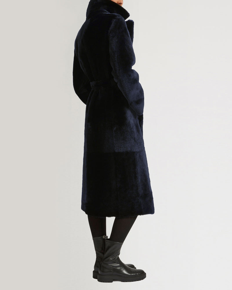 Long reversible belted shearling coat