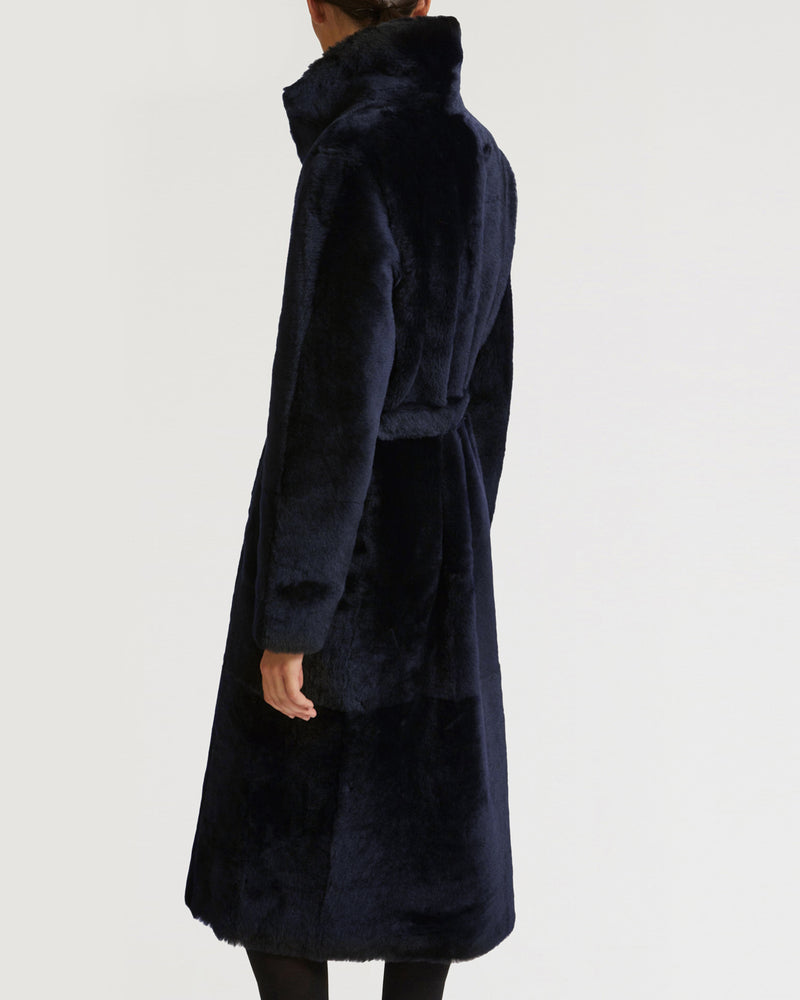 Long reversible belted shearling coat