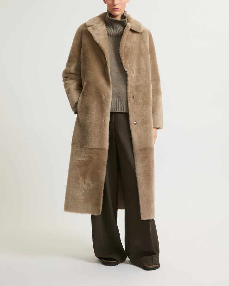 Long reversible belted shearling coat