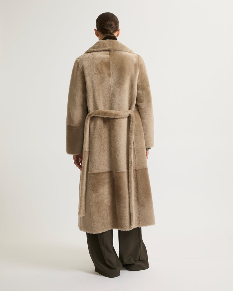 Long reversible belted shearling coat