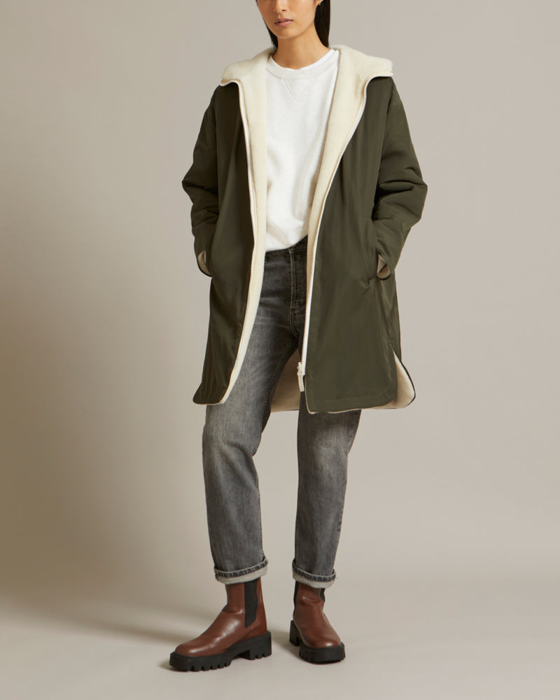 Reversible parka in water-repellent technical fabric and shearling