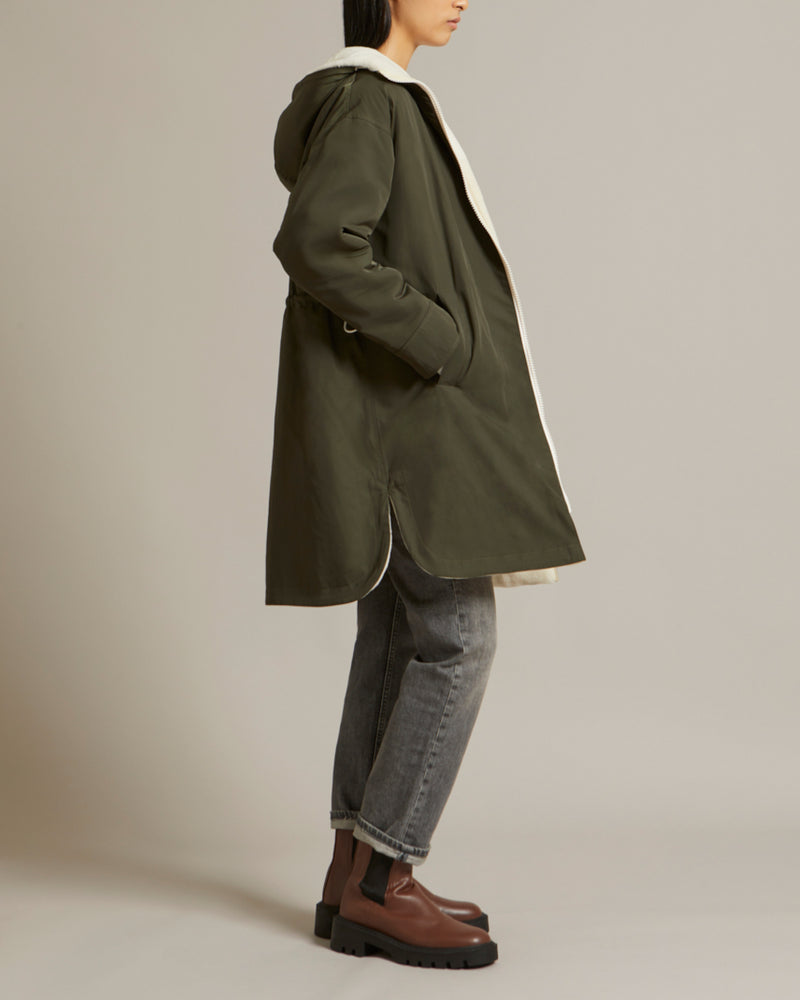 Reversible parka in water-repellent technical fabric and shearling