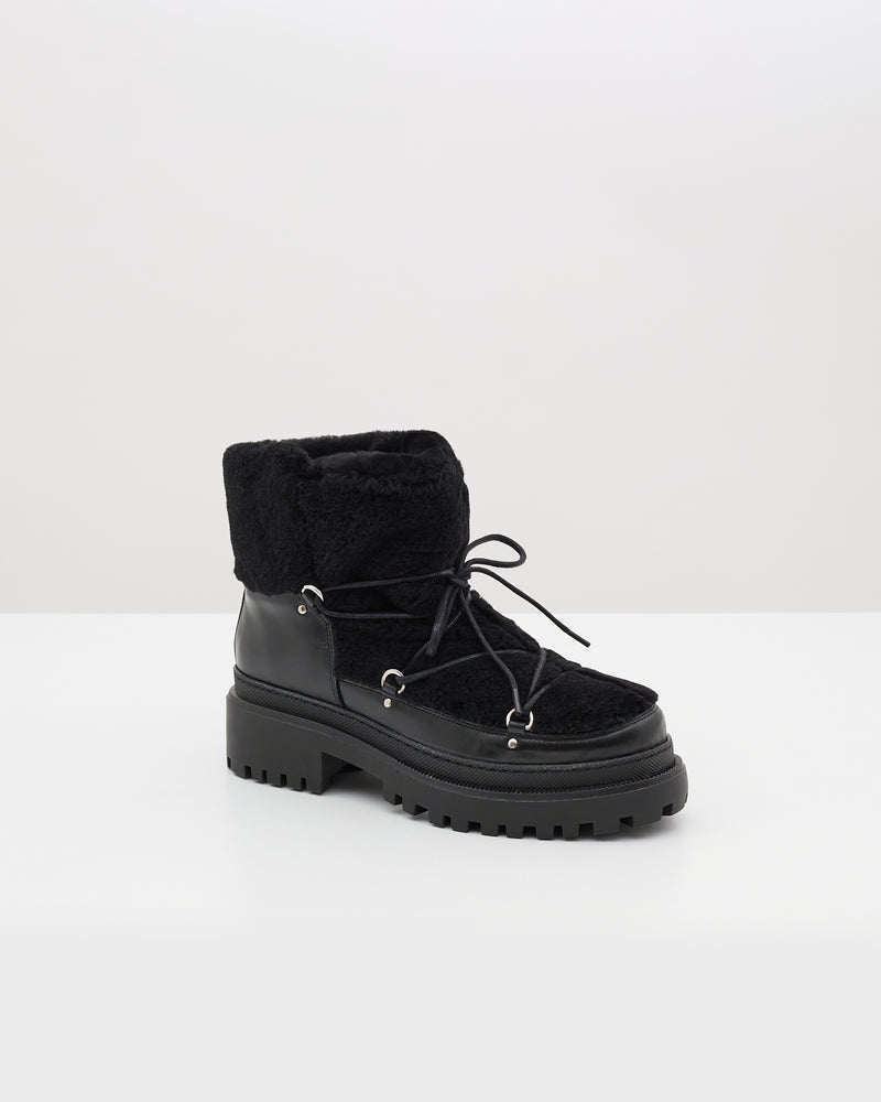 Lace-up mid-length shearling boots