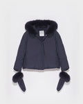 Boxy down jacket in waterproof technical fabric with fox hood trim