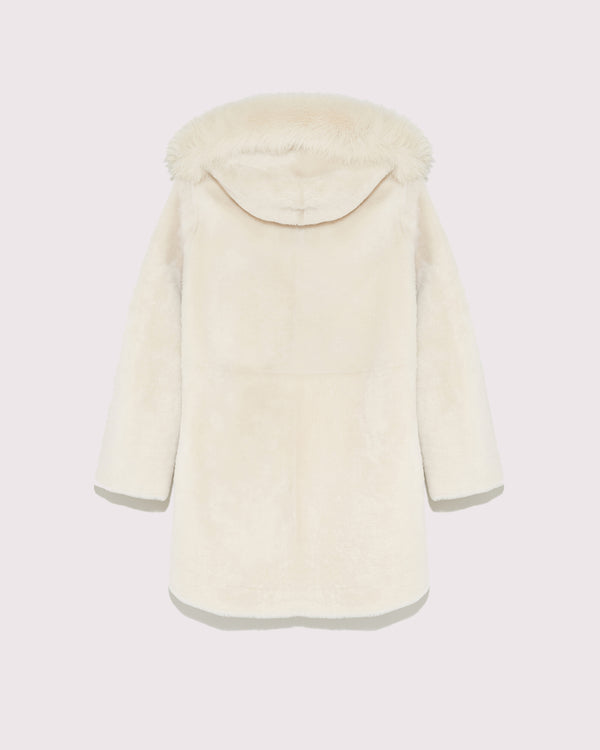 Reversible coat in shearling and fox fur