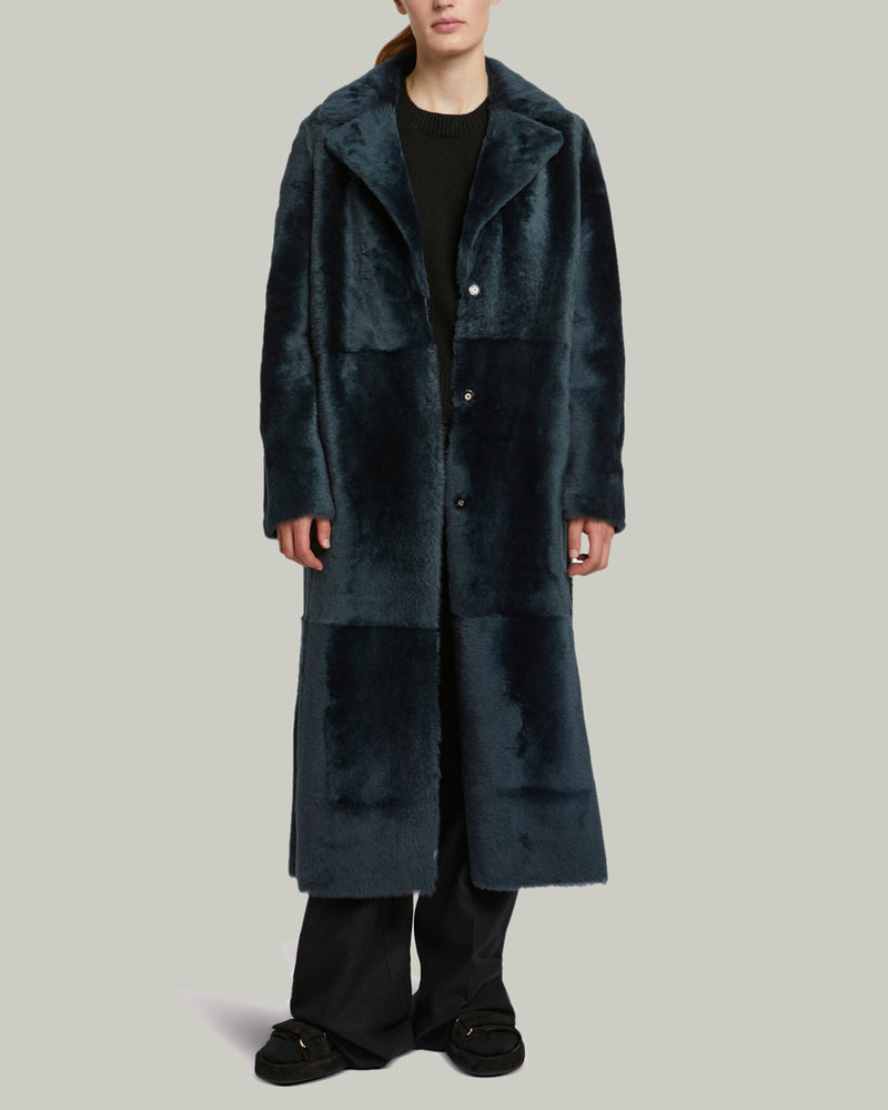 Long reversible belted shearling coat